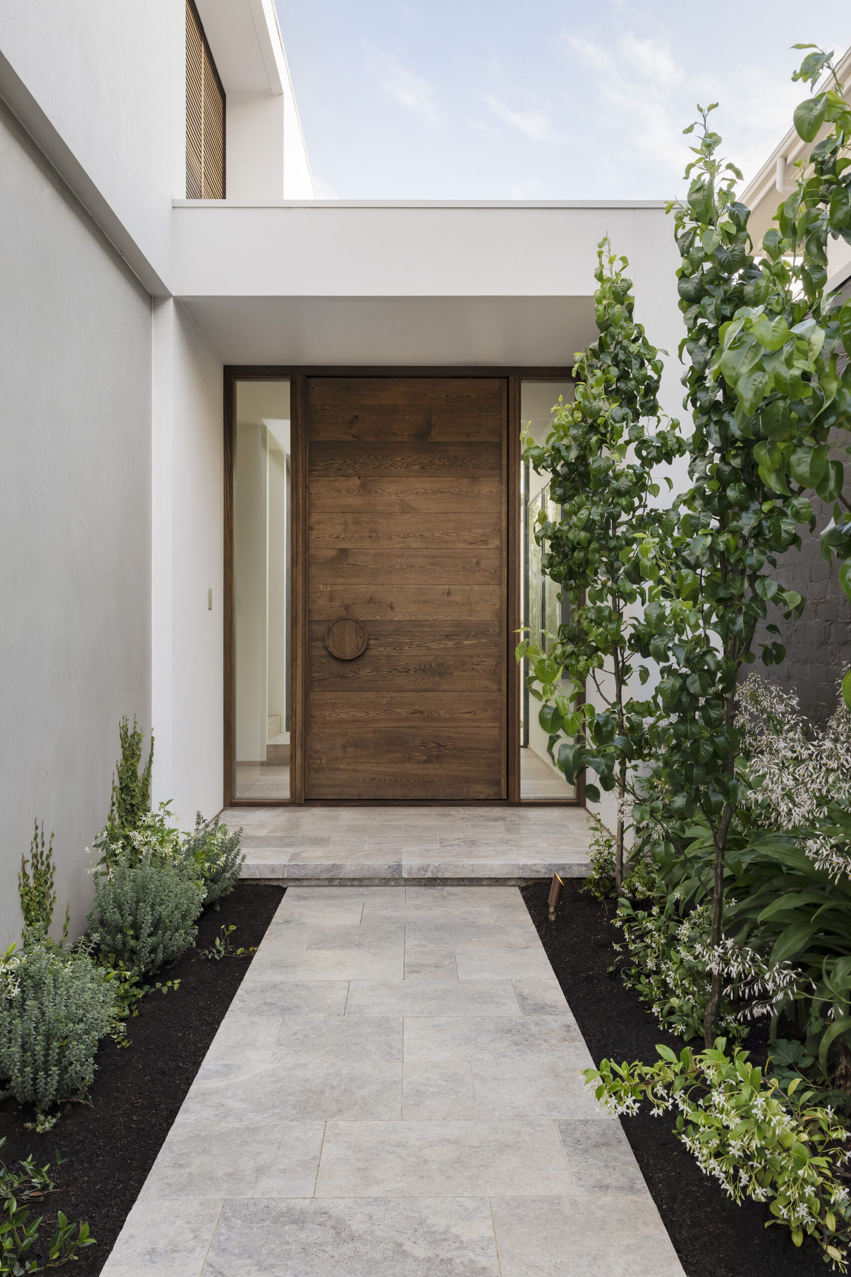 Inviting modern home entrance with wooden door 2026 03 09 05 22 26 utc