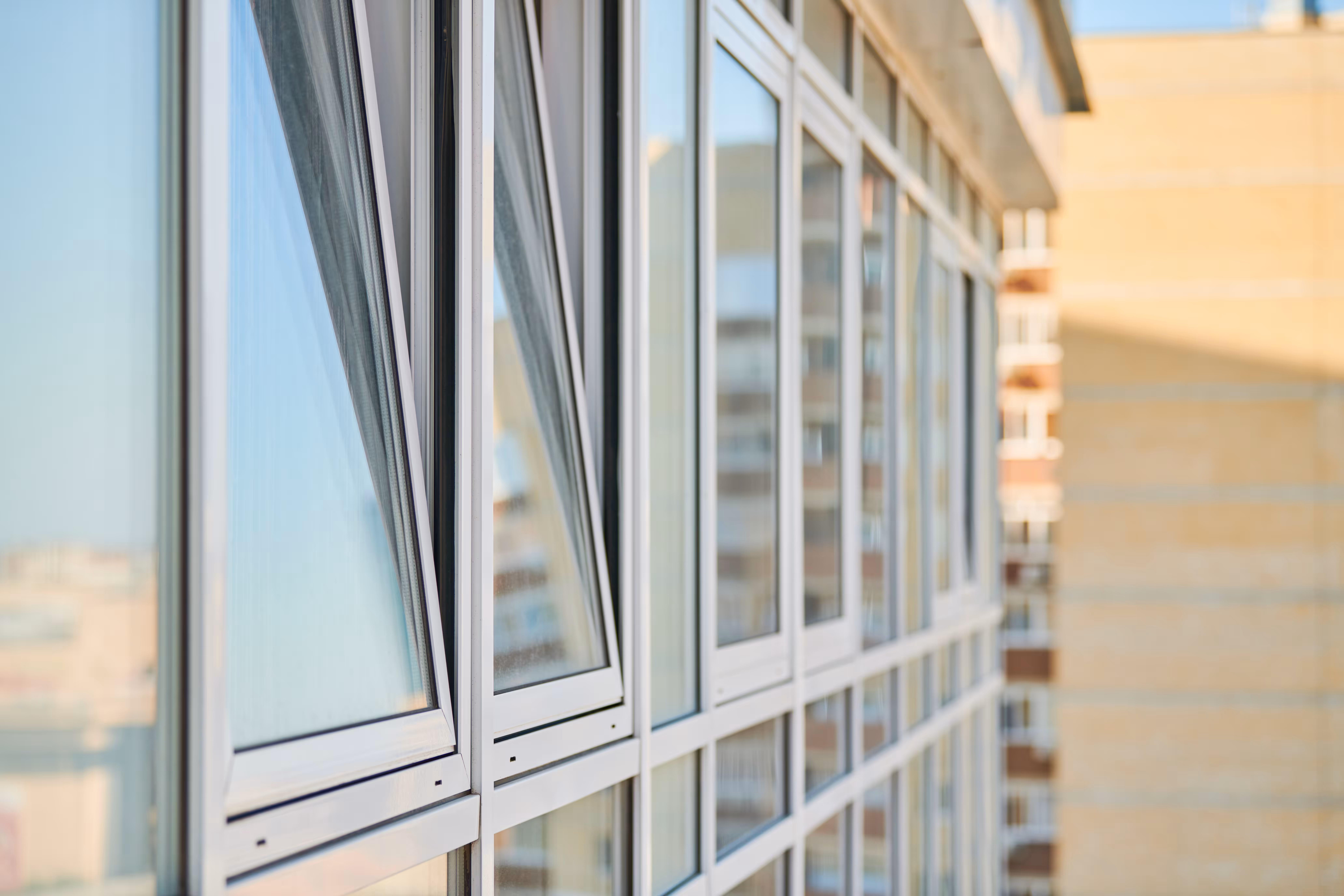 PVC windows on facade of skyscraper